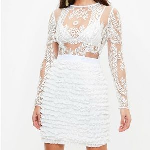 White embroidered ruffle bodycon dress